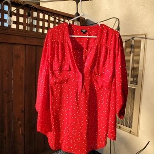 Red blouse with white polka dots